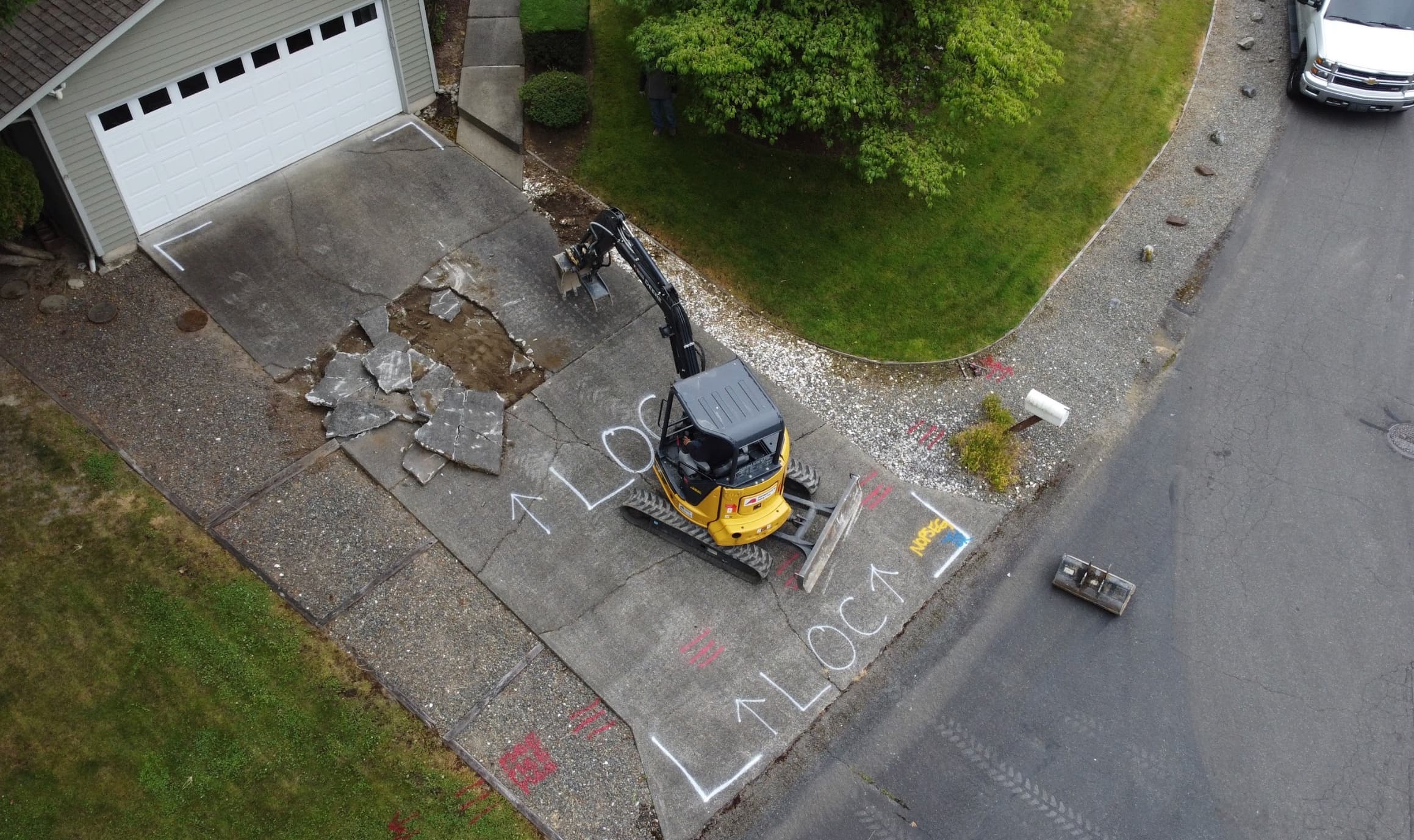 Driveway demolition and base prep phase in Tacoma WA