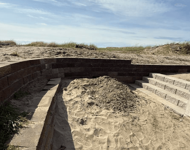 Retaining wall construction phase with grade and step framing in Tacoma WA