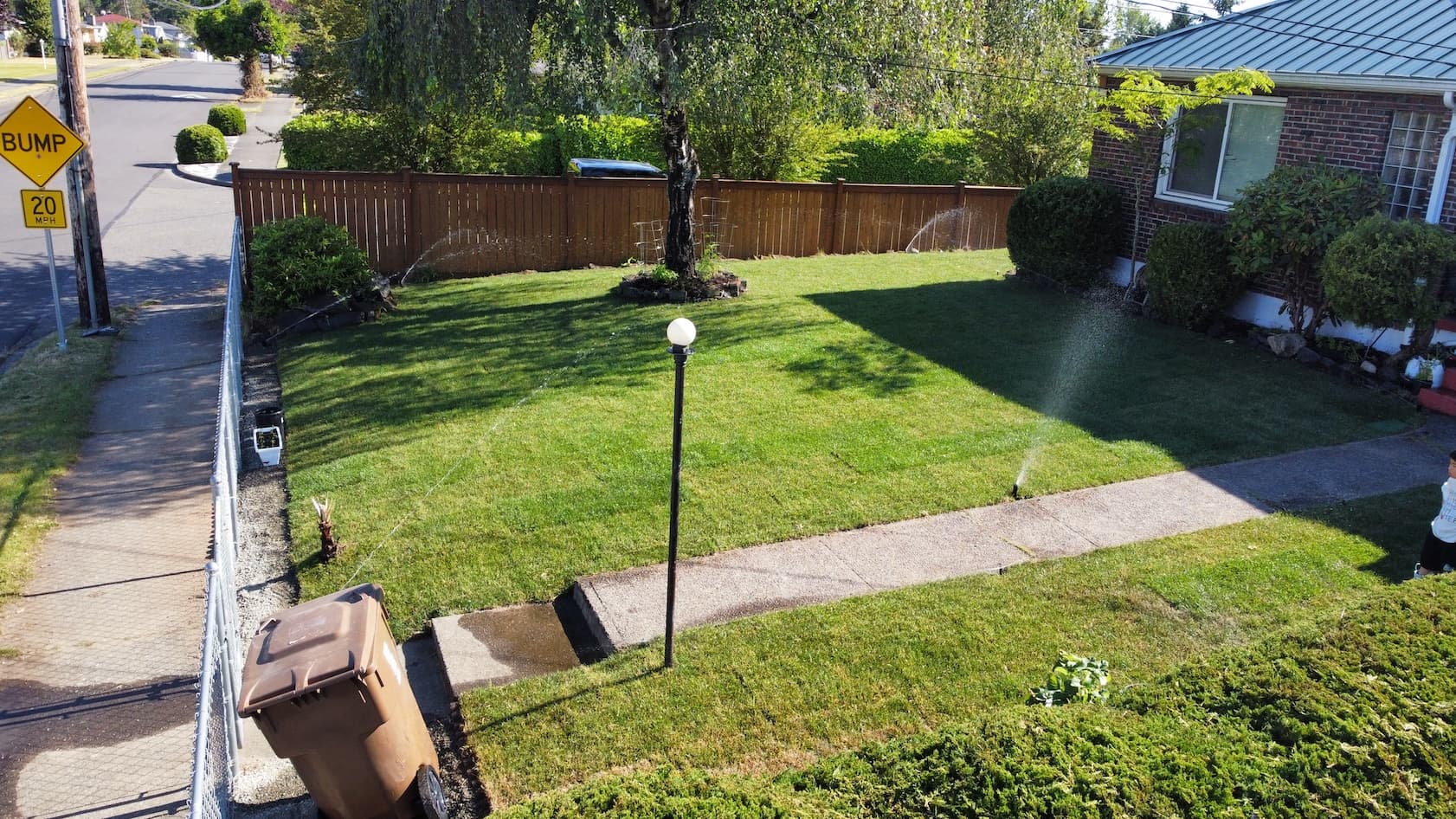 Maintained residential lawn with irrigation coverage in Tacoma WA